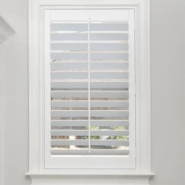 A Timeless 3.5" Louver Shutter covers a window in a mud room.