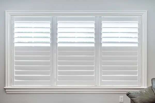 Custom plantation shutters with split tilt louvers for sunlight and glare control in Carolina homes