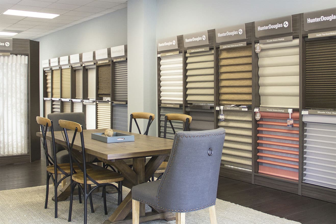 Interior view of displays and worktables at A Shade Above Cornelius