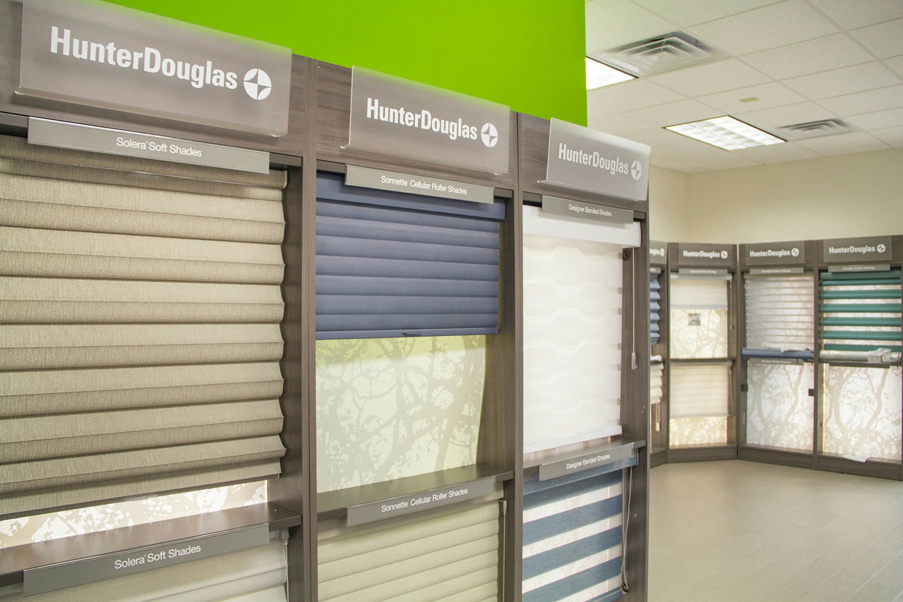 Interior view of window treatment displays in A Shade Above North Myrtle Beach showroom