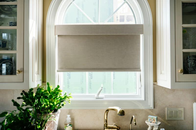 Room Darkening solar shade above a kitchen sink