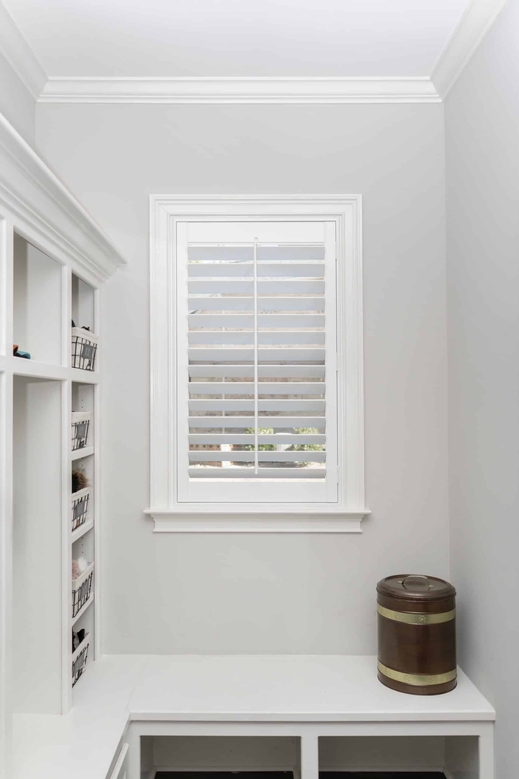 A closed single shutter in a mud room