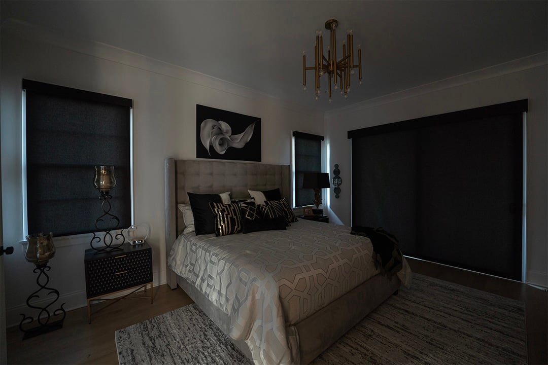 Blackout roller shades providing bedroom light control and privacy in a Carolina home