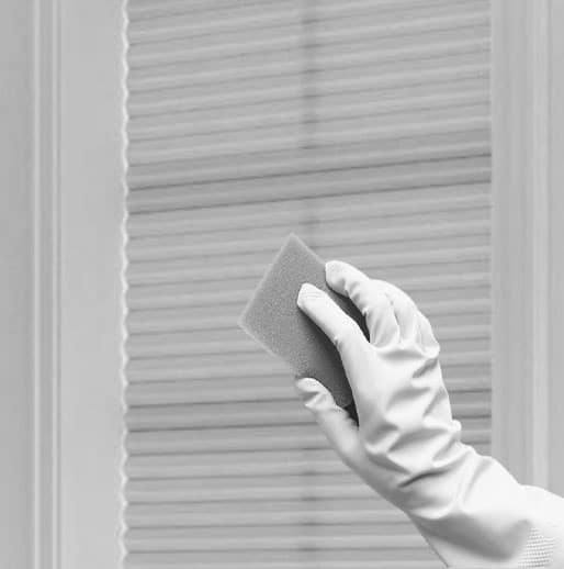 spot cleaning cellular shades with a damp sponge