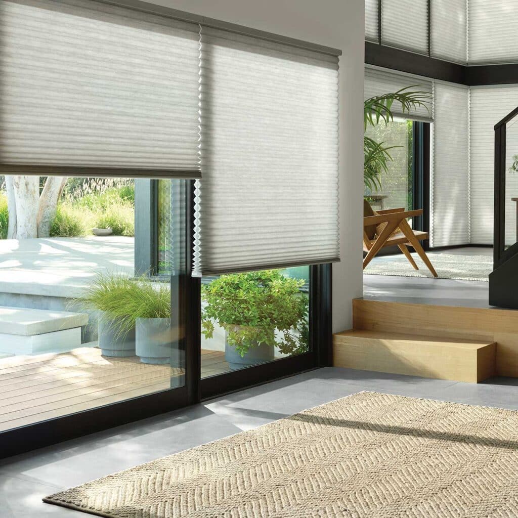 duette honeycomb shades on large sliding doors for energy efficiency