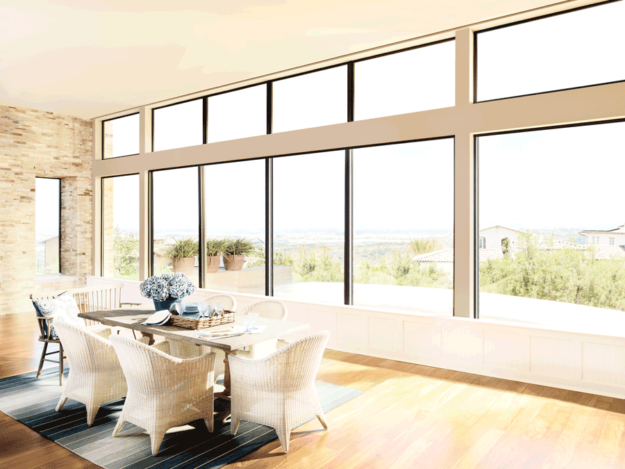 Large uncovered Carolina home windows allowing harsh sunlight, glare, heat and UV exposure into the living room